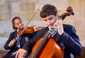 Sydney Catholic Schools Amadeus music students practice the violin and viola