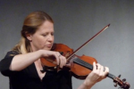 Julia practices the violin
