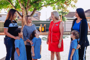 Principal and Parents and studnets talking