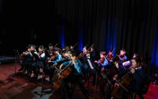 Sydney Catholic Schools students perform in an orchestra at the Eisteddfod Showcase