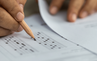 Photo showing a student completing an exam