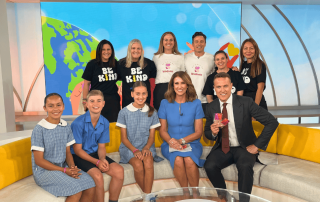 Three St Kevin’s Eastwood students with hosts Natalie Barr and Matt Shirvington, Principal Maree Simpson, James Tobin, MAOK representatives and staff in the Sunrise studio