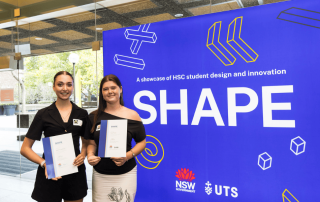 A photo of Pyper Paszyn and Angelina Sanfilippo celebrate being included in SHAPE 2026 for their outstanding projects