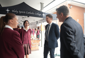 A photo of Holy Spirit Lakemba students with Holy Spirit Lakemba Principal Kevin Griffiths and Education and Research Director Kevin Carragher