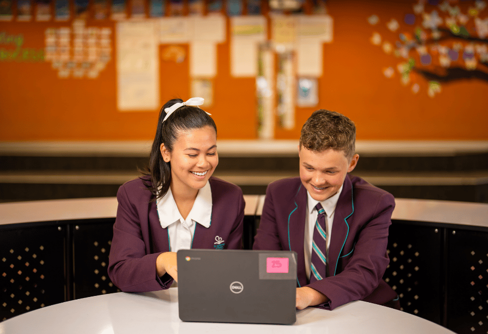 A photo showing two St Anthony of Padua Catholic College Austral students studying on their way to 2026 NAPLAN success
